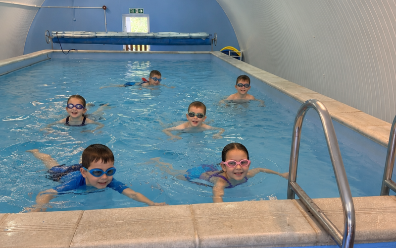 🏊 Children enjoying a swim in our pool